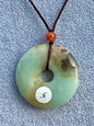 Pendentif donut en pierre naturelle