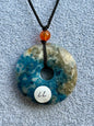 Pendentif donut en pierre naturelle