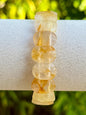 Bracelet jonc souple en quartz hematoide jaune - golden healer facetté pierre semi précieuse