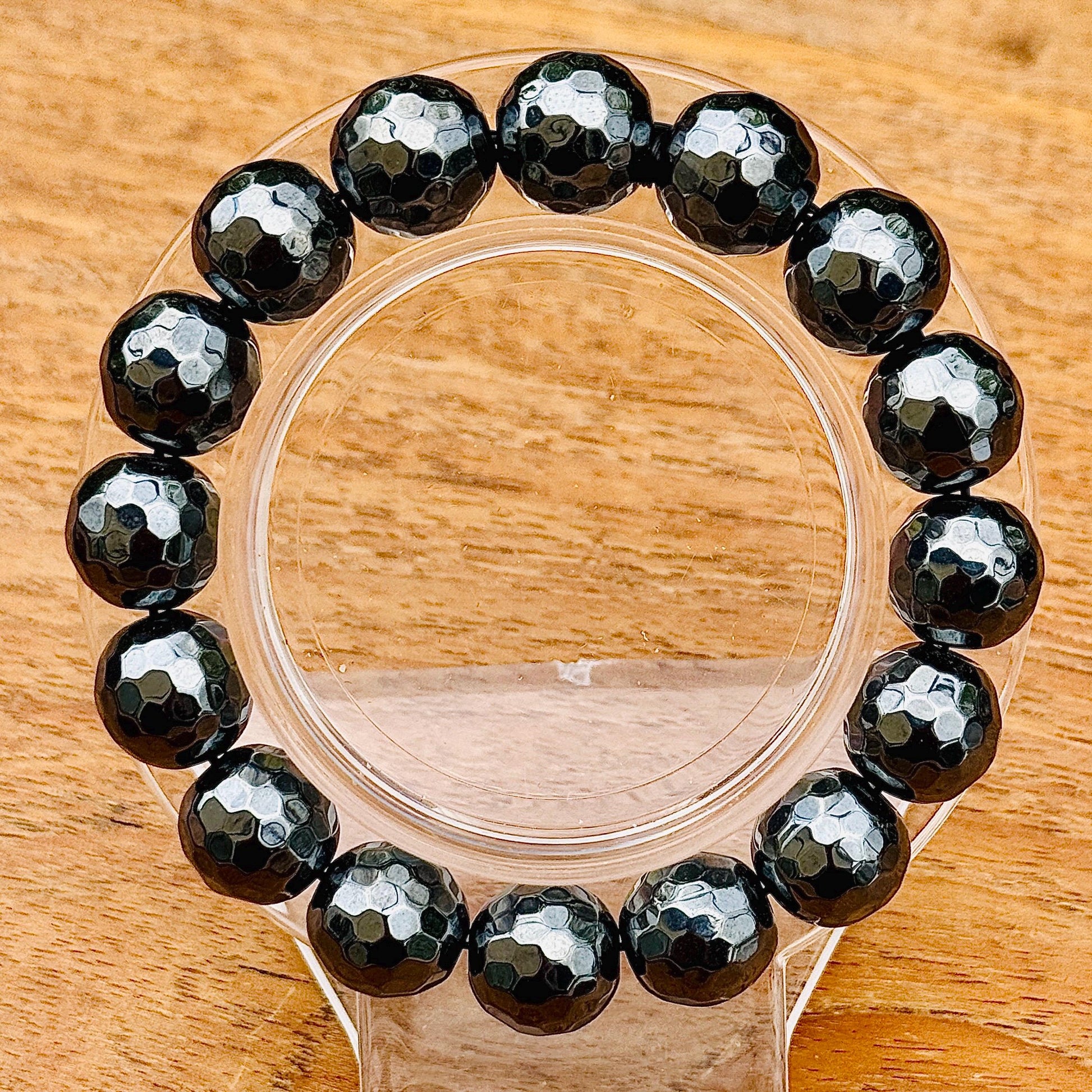 Bracelet perles rondes facettées en hématite pierre semi précieuse