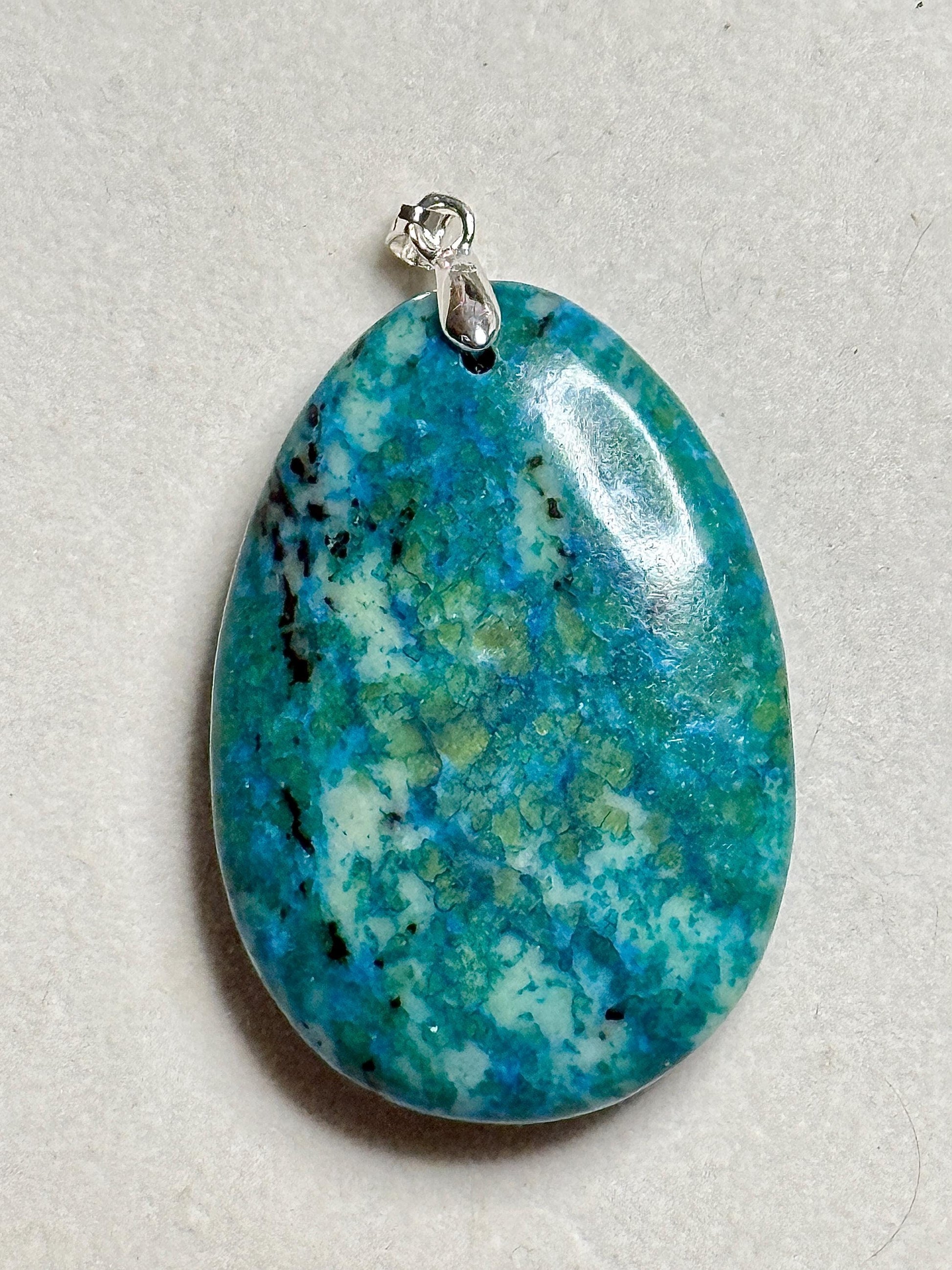 Pendentif en phœnix pierre naturelle semi précieuse