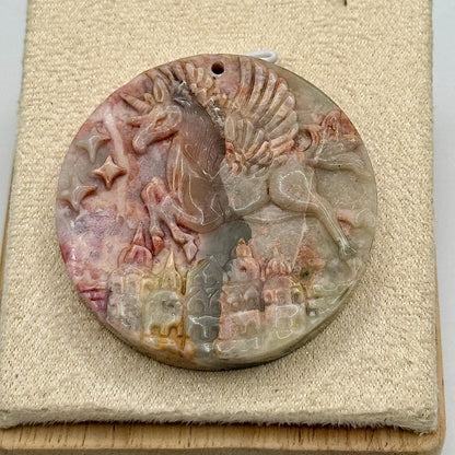 Pendentif en rhodonite sculptée pierre naturelle semi précieuse