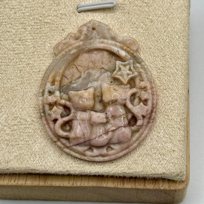 Pendentif en rhodonite sculptée pierre naturelle semi précieuse