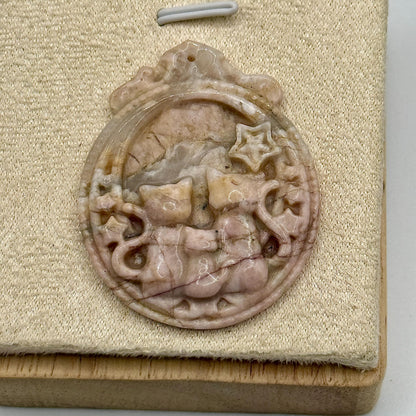 Pendentif en rhodonite sculptée pierre naturelle semi précieuse